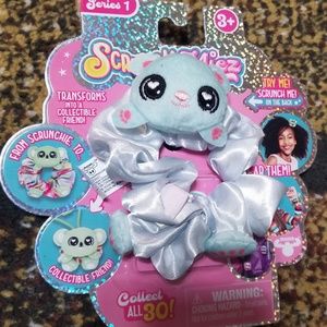 Scrunchmiez Light blue puppy scrunchie. SpaceScrunchy Backpack Clip Toy Series 1